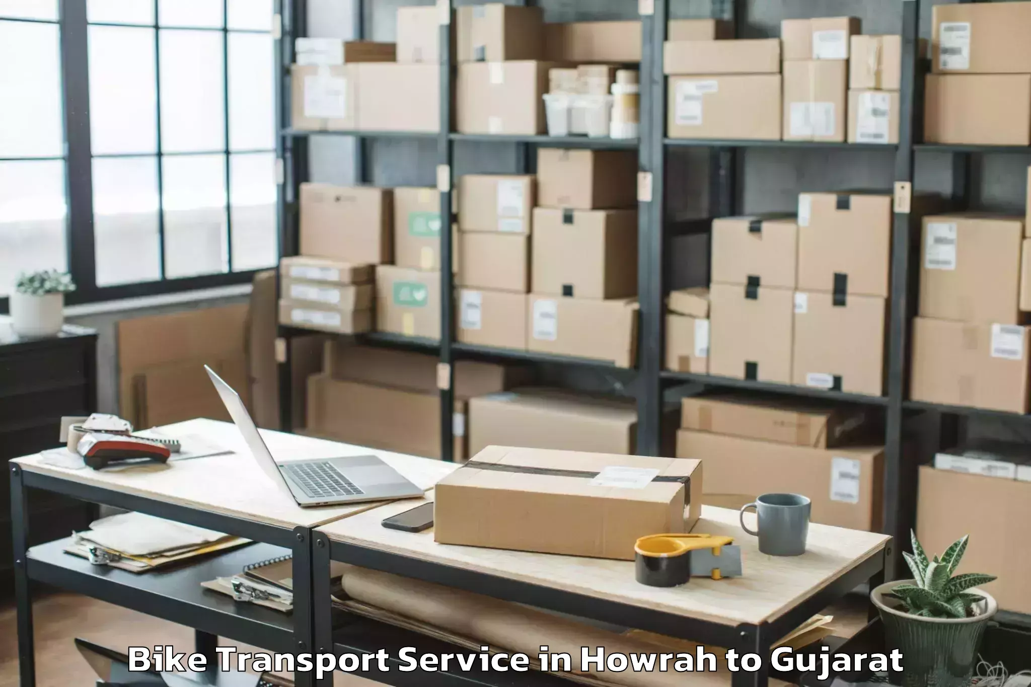 Top Howrah to Gujarat National Law Universit Bike Transport Available